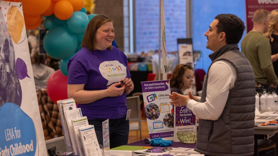 Teachers gather at an educational vendor fair