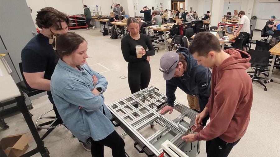 Manufacturing and mechanical engineering students work on their capstone project
