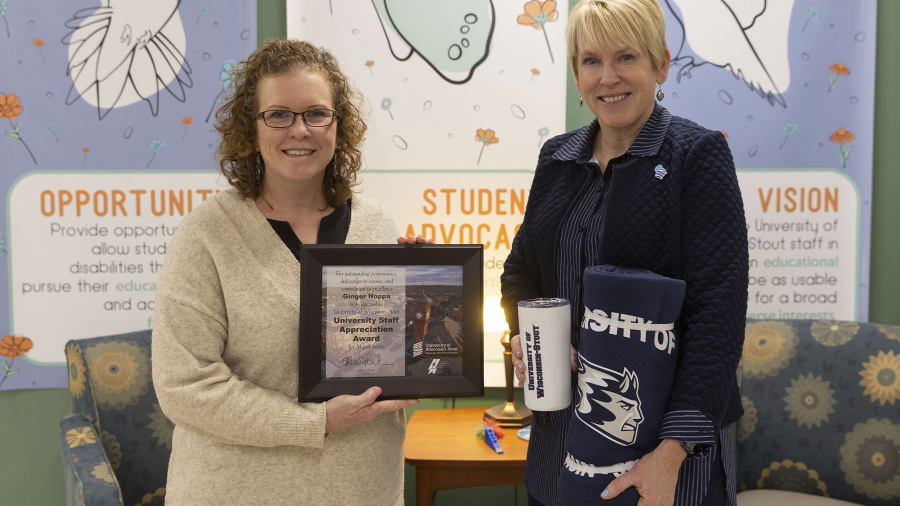 Two women with award