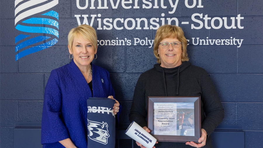 Two women with award