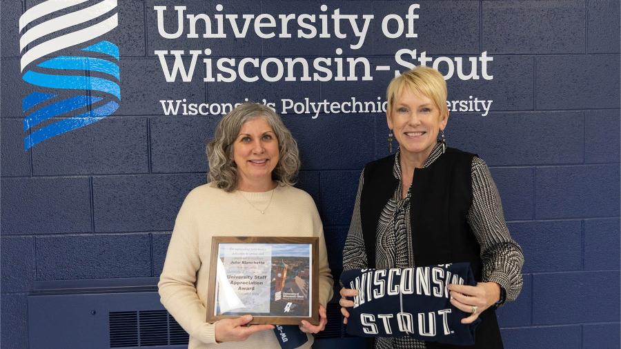 Two women with award