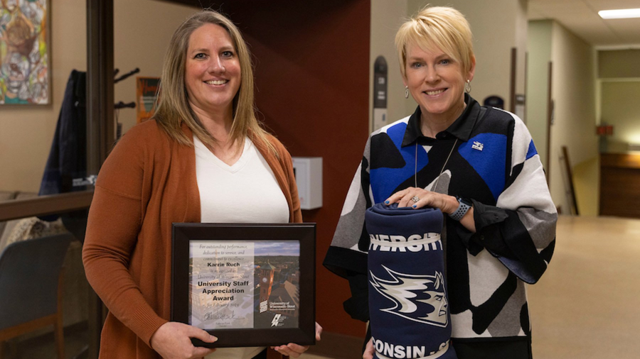 Two women with award