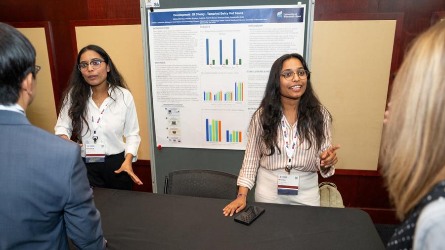 Nichitha Bhookya and Nikitha Bhookya present at the WiSys Innovation Showcase