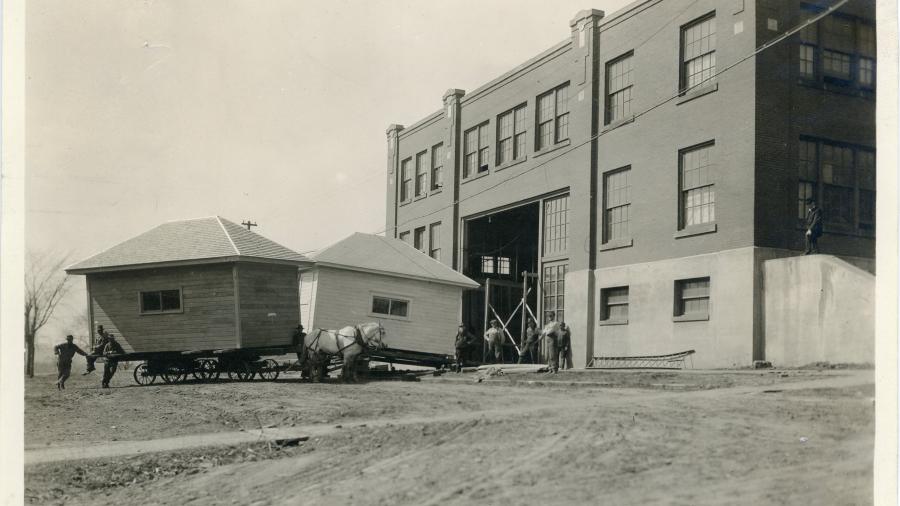 Black and white image of small buildings