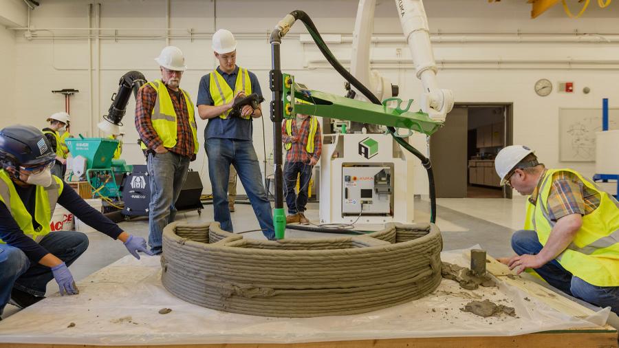 People work with concrete printed planter