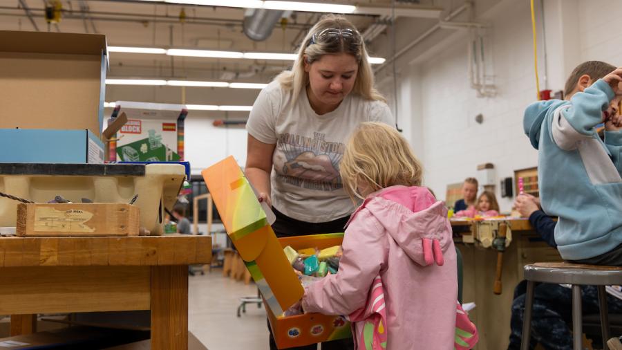 Engineering students designing manufacturable toys with kindergartners