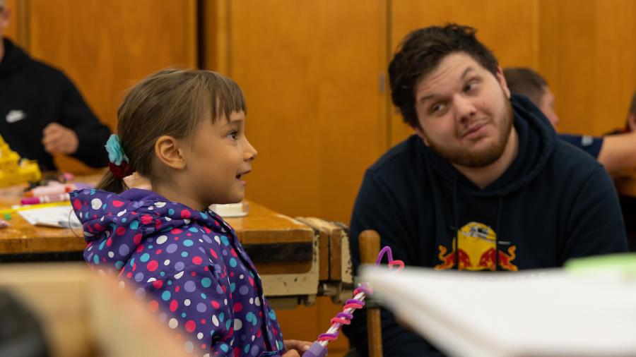 Engineering students designing manufacturable toys with kindergartners