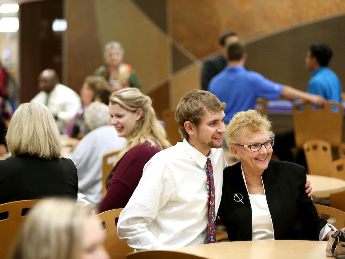 The Stout University Foundation hosts the annual Scholarship Reception Thursday, September 14, 2017. Pictured are donors and recipients during dessert in the MSC Terrace. UW-Stout student Sylas Rehbein, of Viroqua, poses for a photo with donor Patricia Rose Rooney after receiving the Homer C. Rose Memorial Scholarship. Rehbein is majoring in mechanical engineering. (UW-Stout photo by Brett T. Roseman)