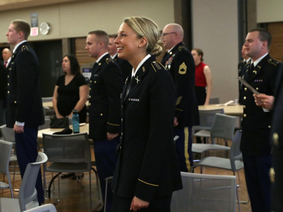 Cadets stand at attention during a 2015 Army ROTC Northwoods Battalion commissioning ceremony at UW-Stout.