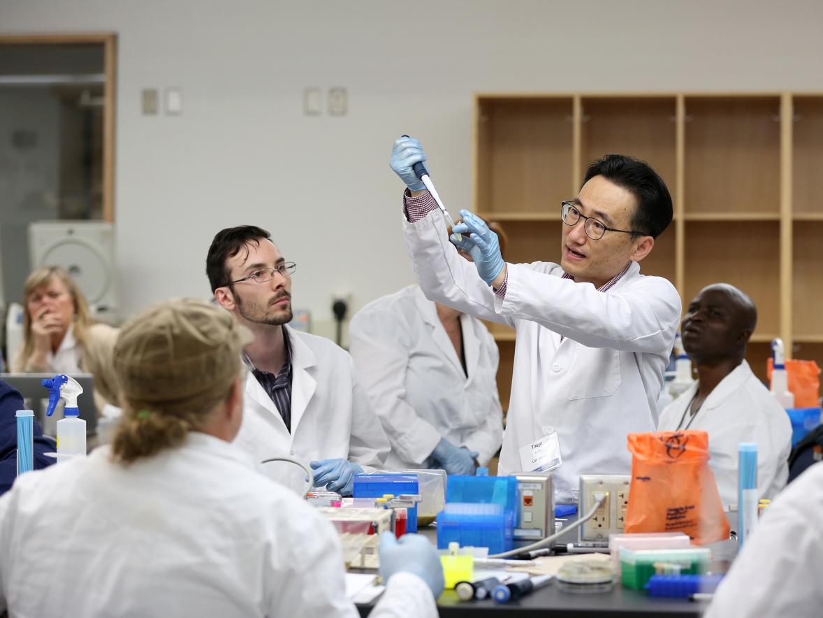 Taejo Kim, University of Wisconsin-Stout assistant professor in the department of food and nutrition, describes food safety and testing for foodborne pathogens at a UW-Stout Furthering Food Safety Workshop. /UW-Stout photos by Brett T. Roseman.