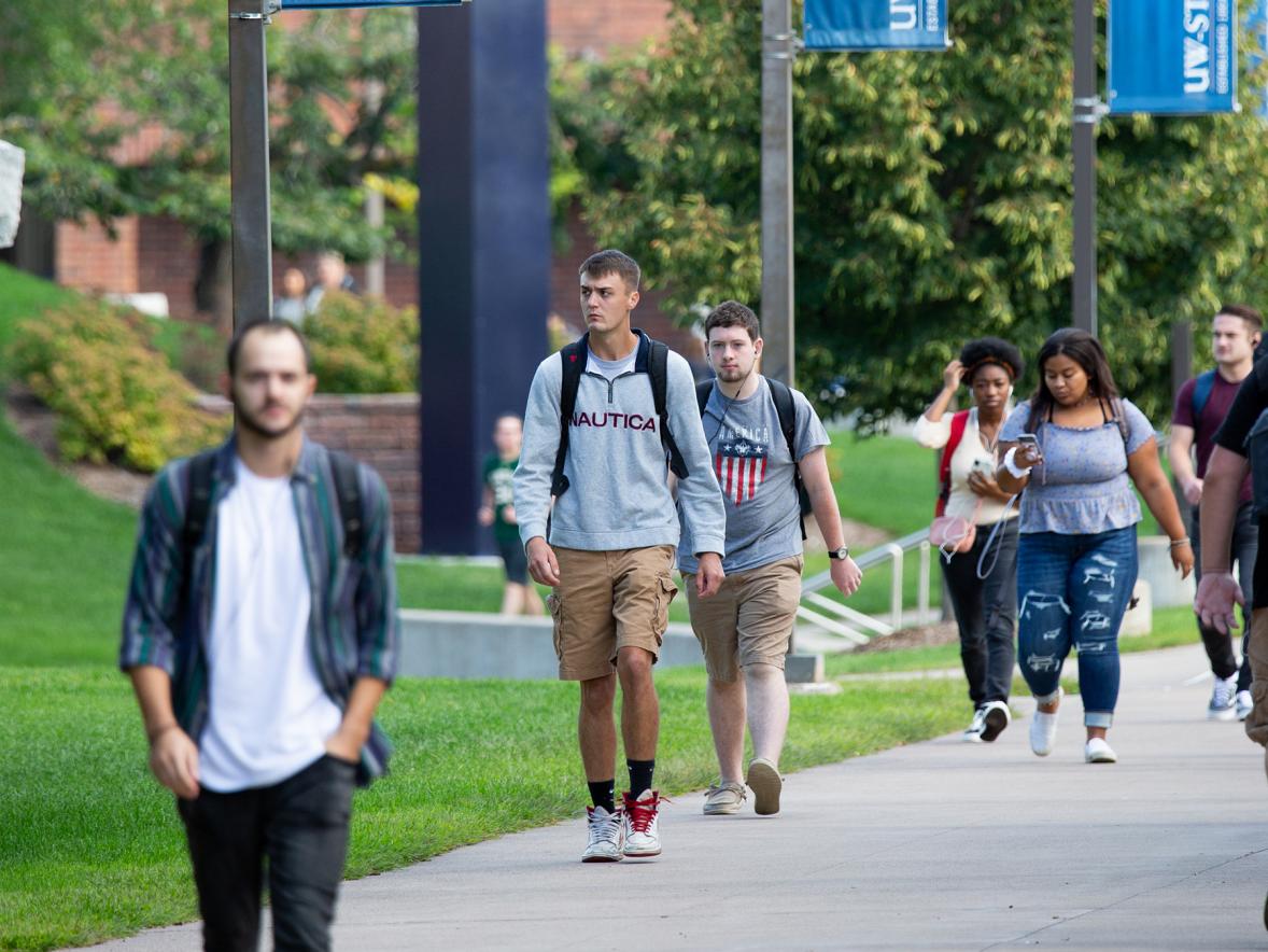 Students walk between buildings Wednesday, Sept. 4, at UW-Stout during the first day of 2019-20 fall semester classes.