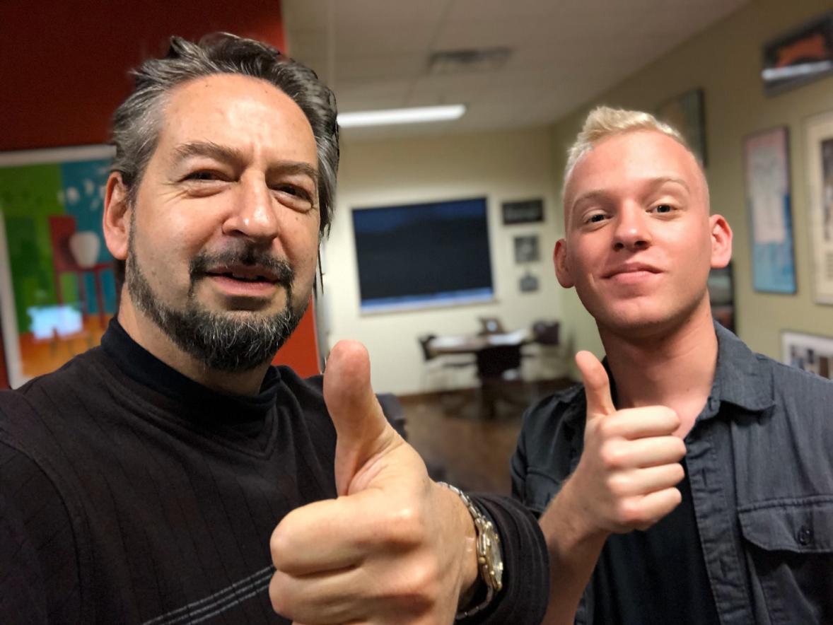 UW-Stout video production student Devin Leary, right, edited “The Most Epic Music Video in LinkedIn History,” which co-starred branding expert David Brier, left, of Menomonie.