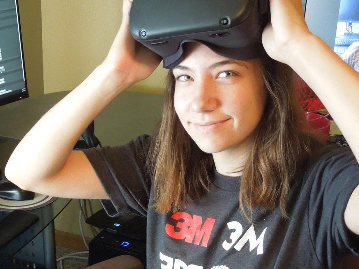 Mary Benetti, game design and development senior, with her Oculus Quest virtual headset.
