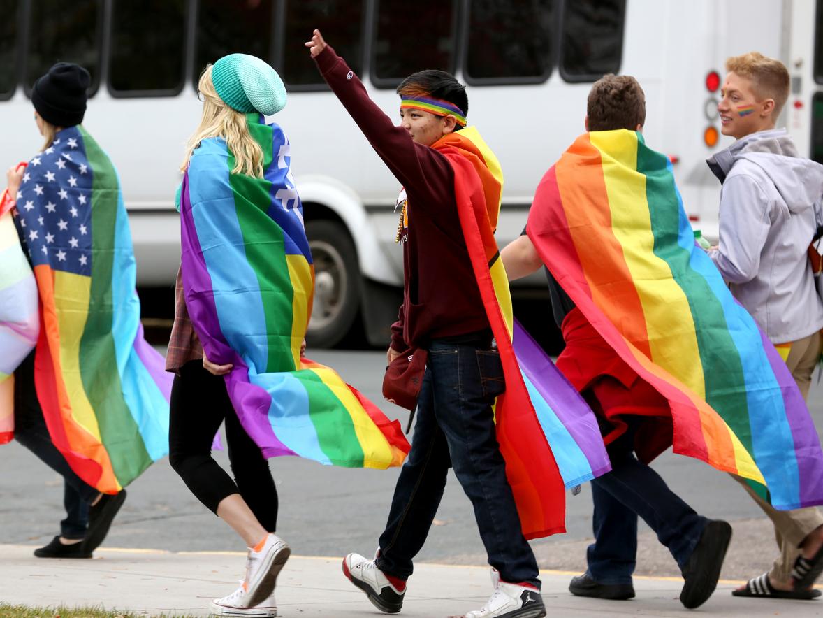 Students take part in a Pride parade in 2014. UW-Stout offers Safe Space Training that helps teach about issues facing the LGBTQIA+ community and how to be an ally.