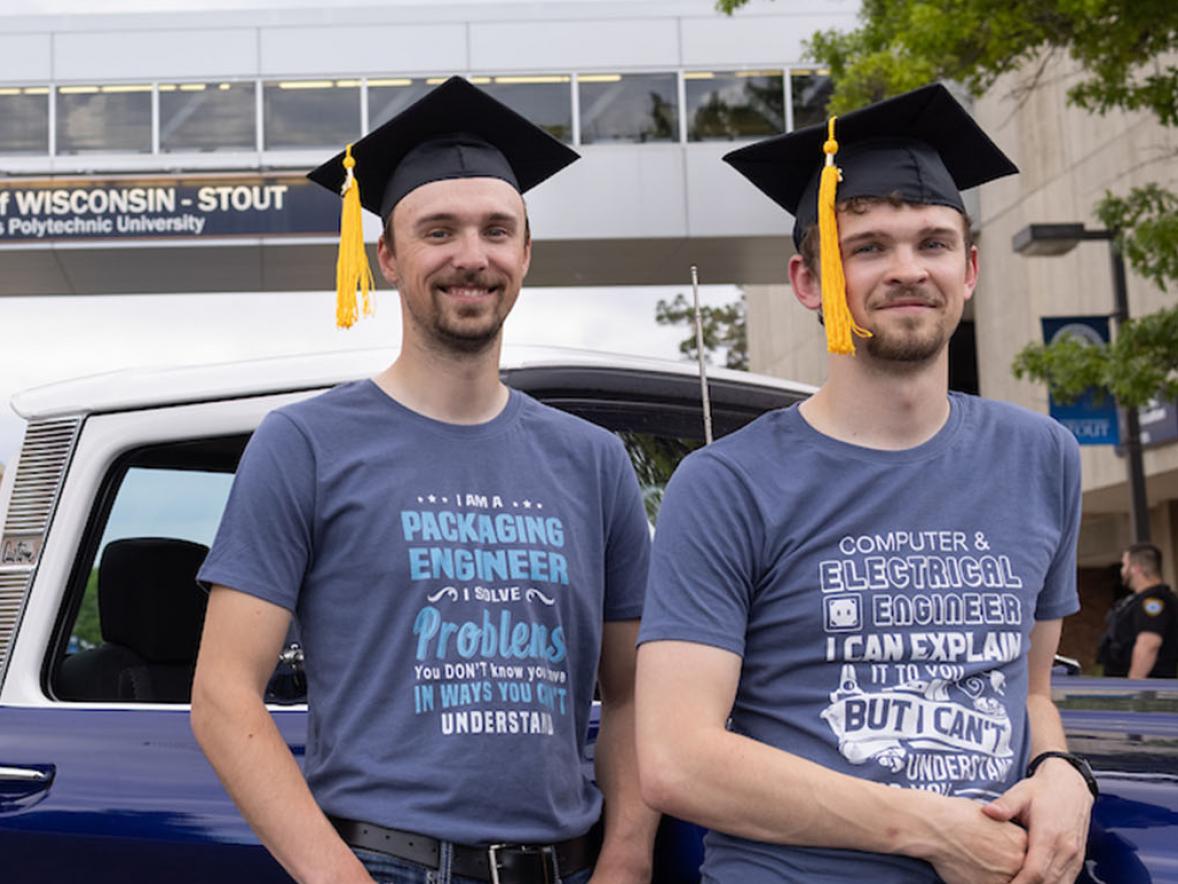 First-generation graduates Alex and Andrew Grulkowski with the 1966 Chevrolet C10 pickup they remodeled.