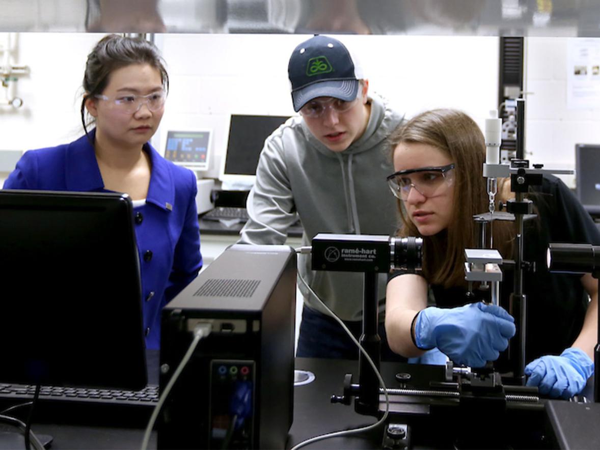 Associate Professor Min DeGruson with students in the Packaging Materials course.