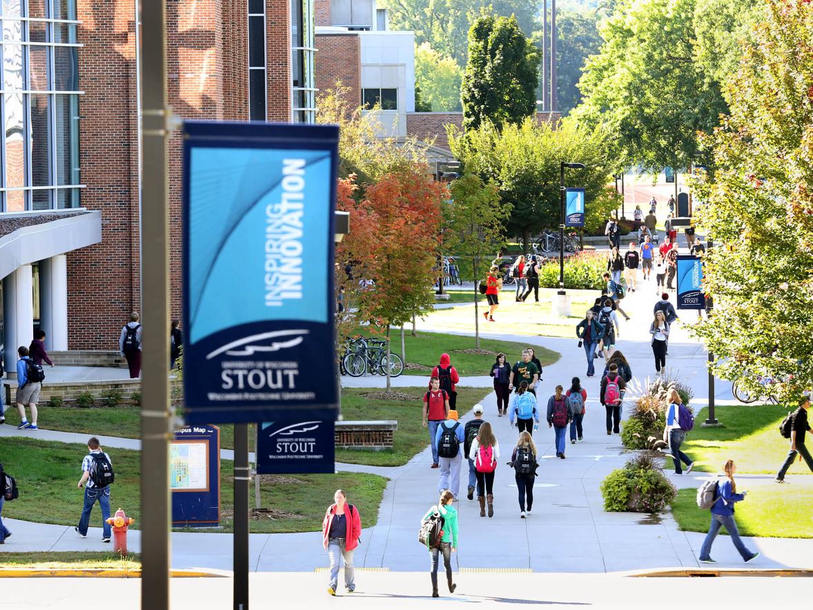 Students walk through campus between Jarvis Hall and the Memorial Student Center.