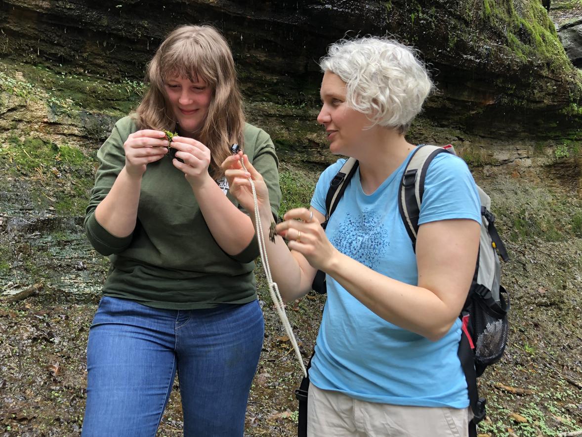 Student Britney Serafina, left, and Professor Amanda Little talk about their plant research at Devil’s Punchbowl.
