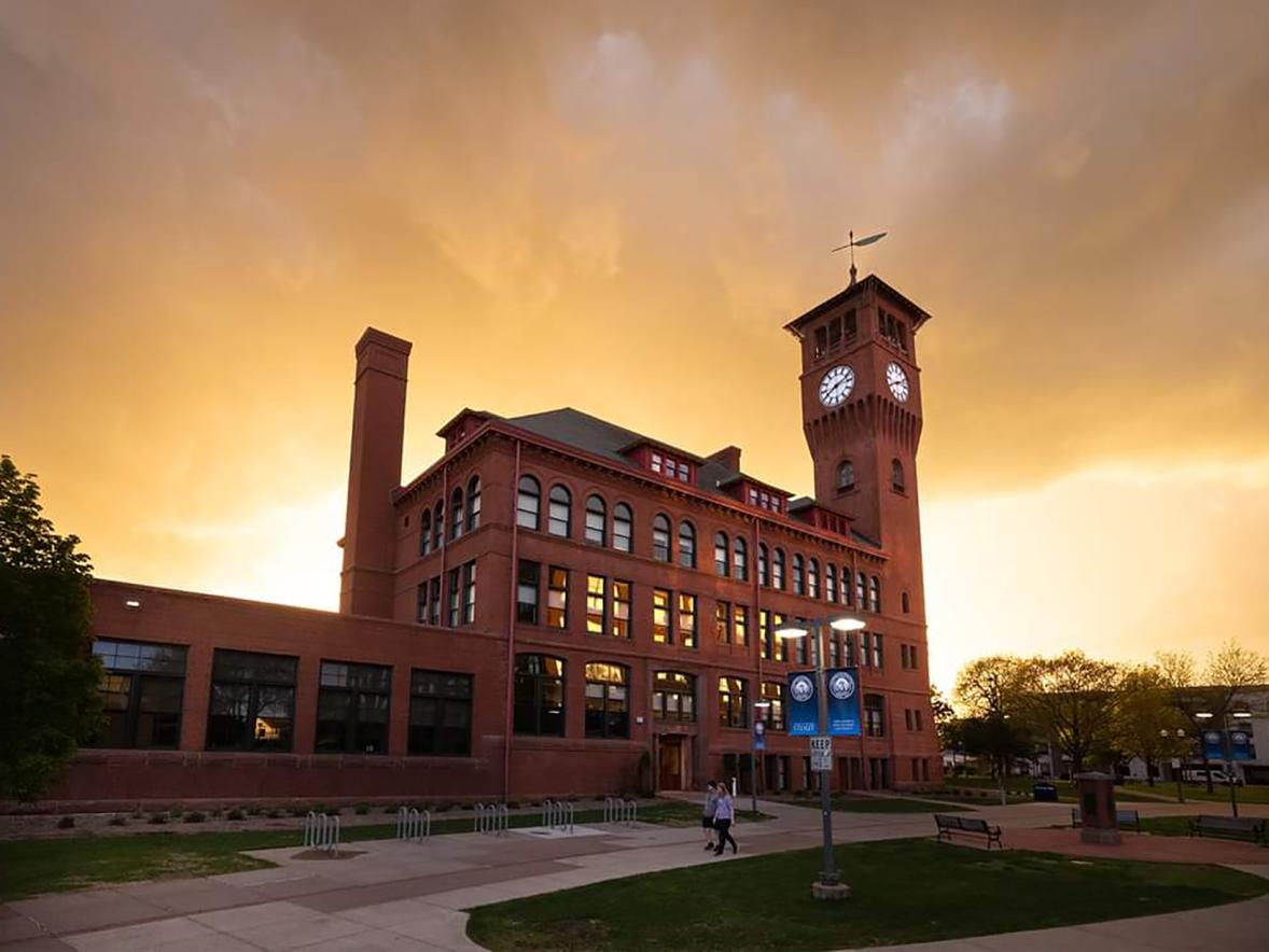 An image of Bowman Hall and the Clock Tower after a storm passed in June has been chosen as the top photo of 2022 at UW-Stout.