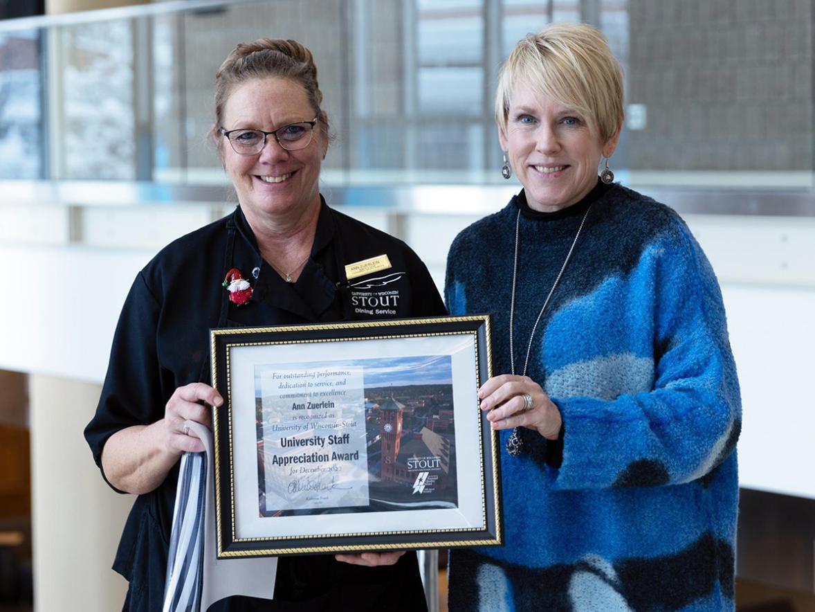 Ann Zuerlein, left, receives the December University Staff Employee Appreciation award from Chancellor Katherine Frank.