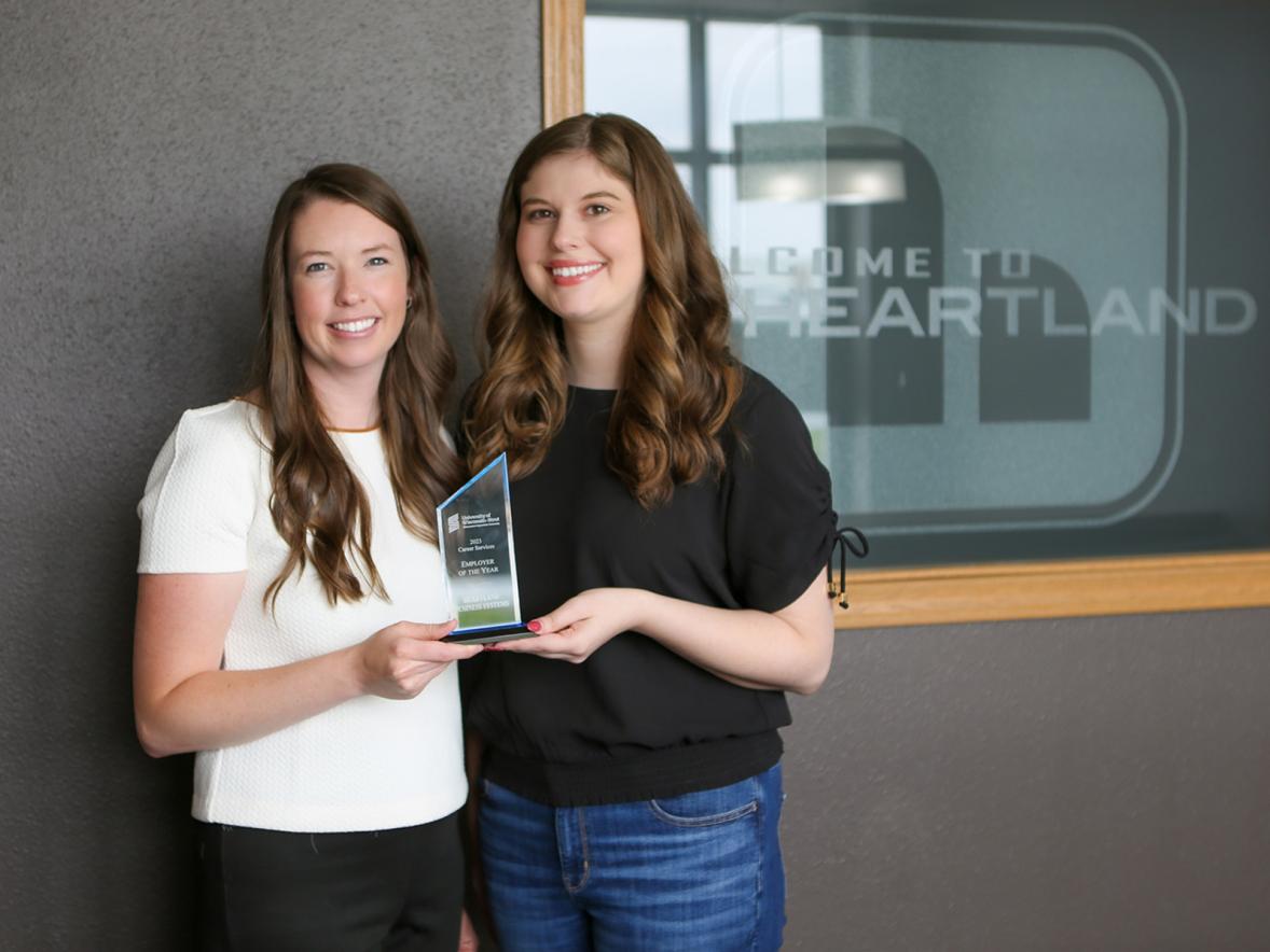 Kristin and Abby with award