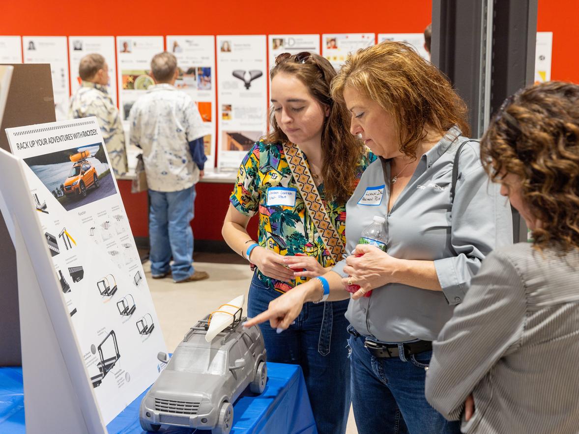 Guests at Design Wisconsin check out a product design display.