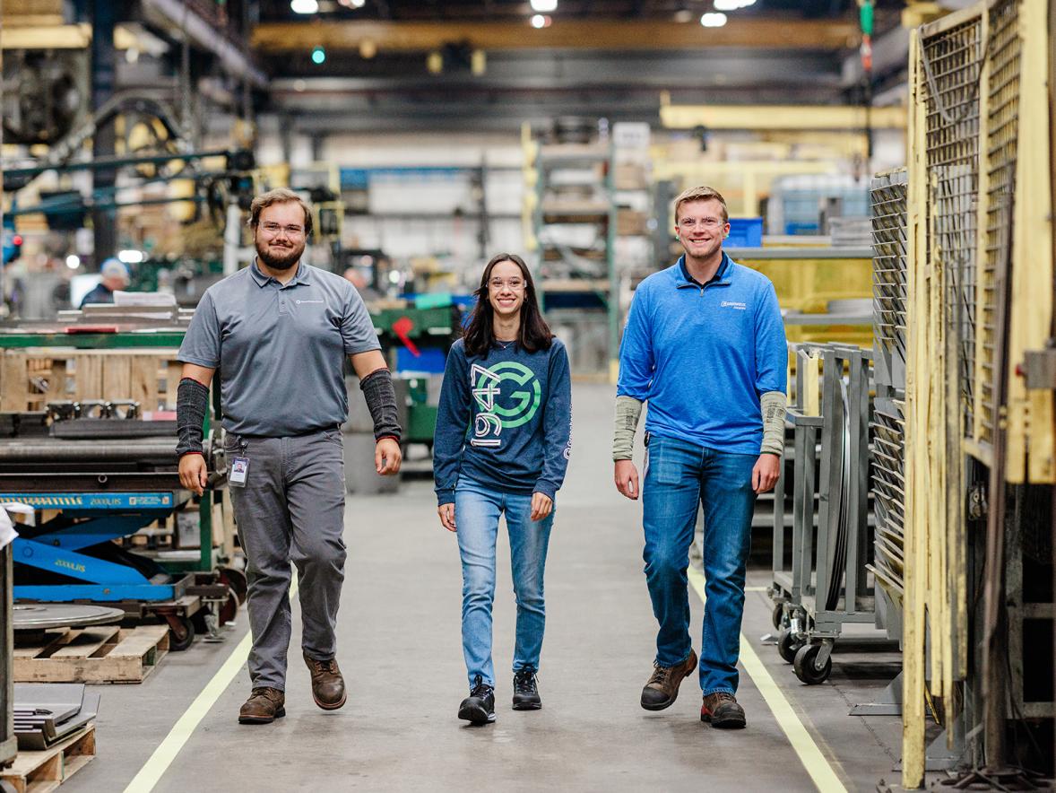 Austin Zoborowski, left, and Brady Wagner, right, are recent UW-Stout graduates who had co-op experiences at Greenheck Group and now work full time for the Wisconsin-based company.