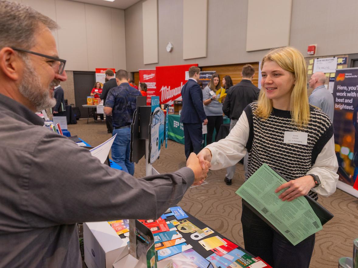 Students meeting with recruiters at the Career Conference