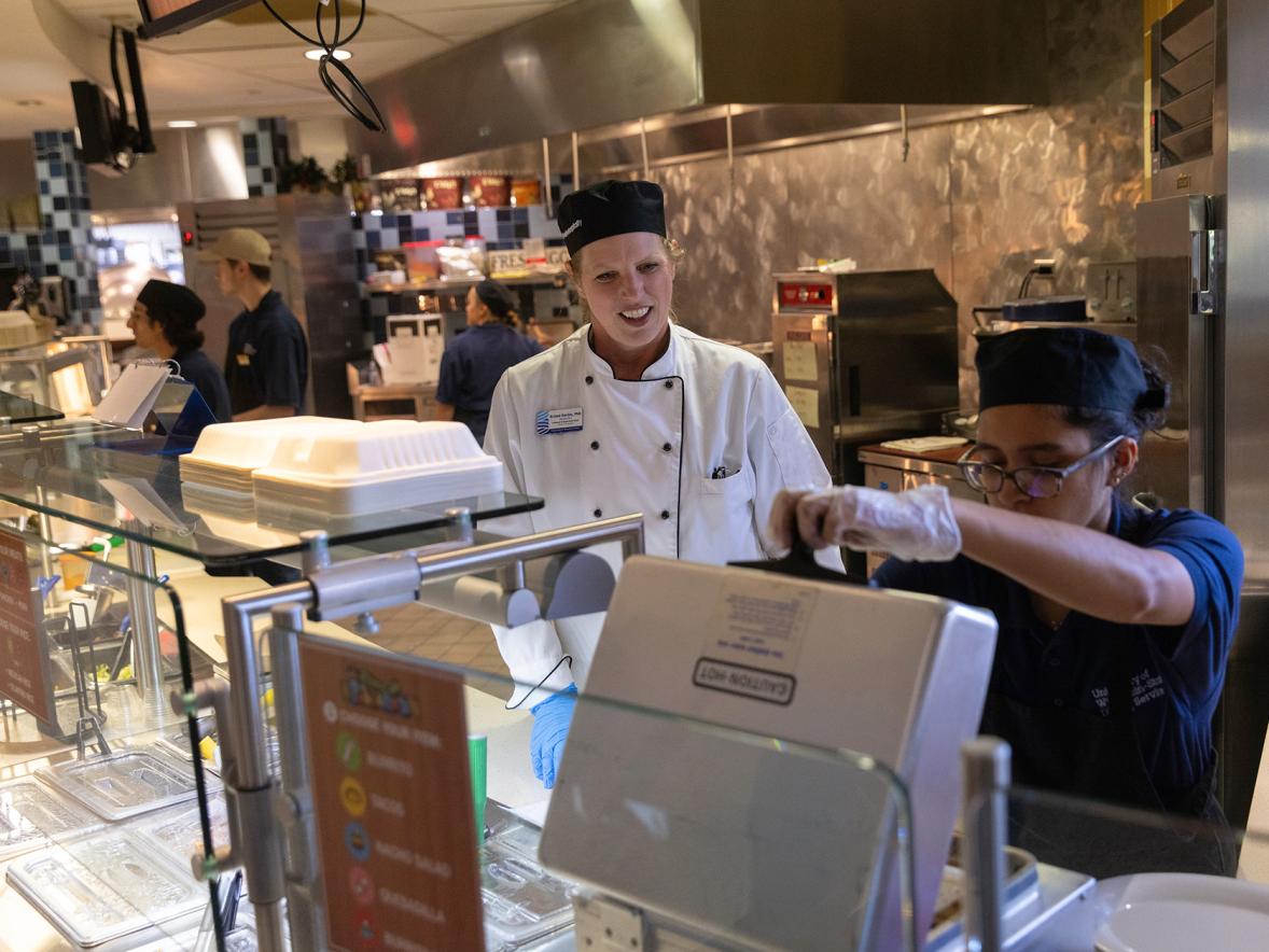 Nicolle Demulling, a dietetics student, works at Fireside Café under the direction of Professor Kristal Gerdes.