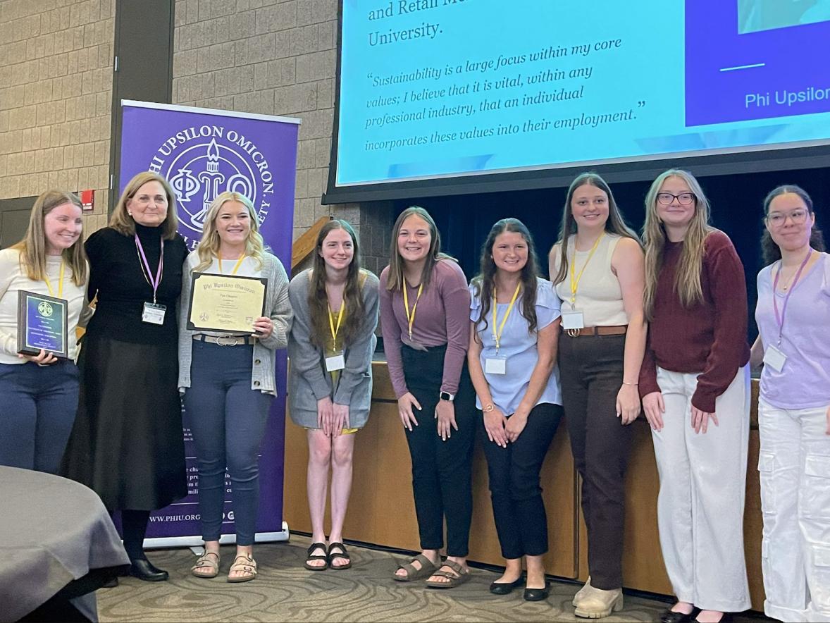 Tau Chapter members receive their national service award