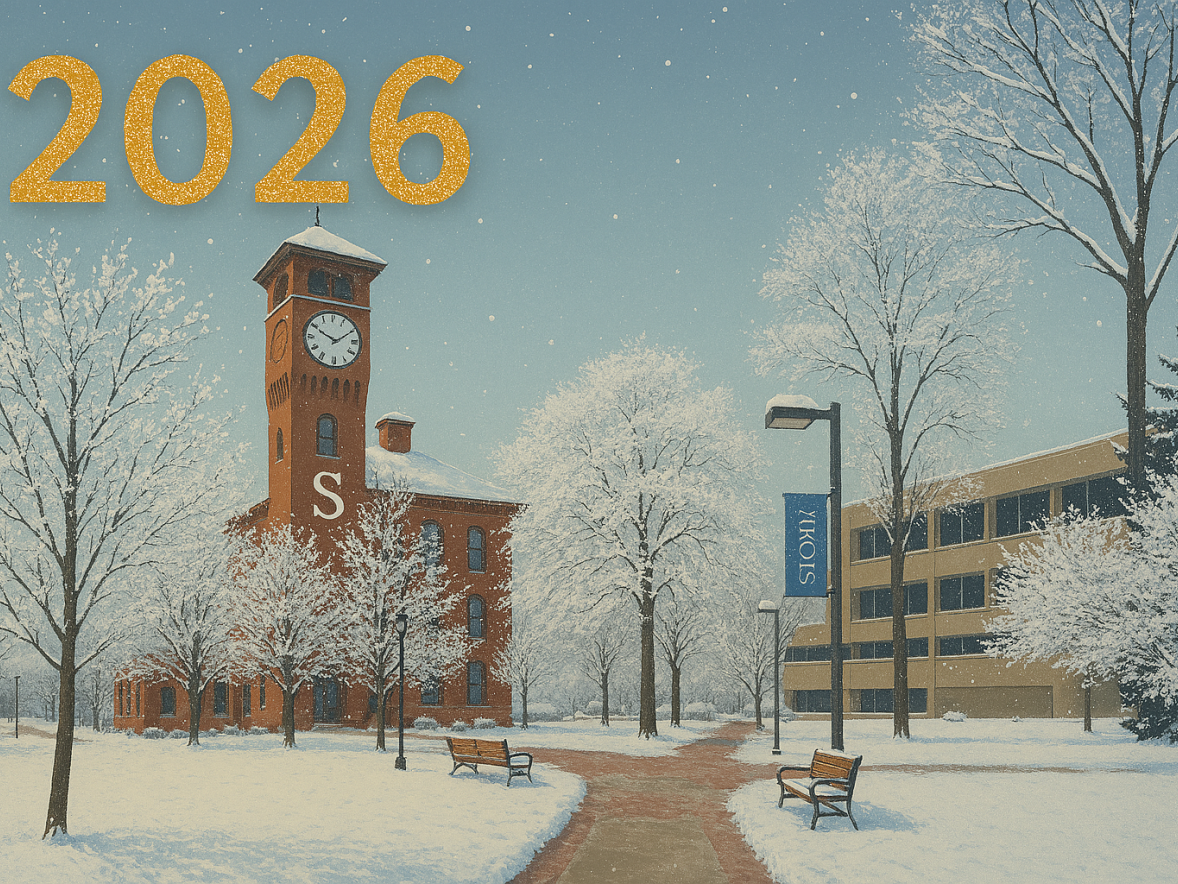 UW-Stout campus in winter, showing the clock tower and Administration building, with 2026 in the background