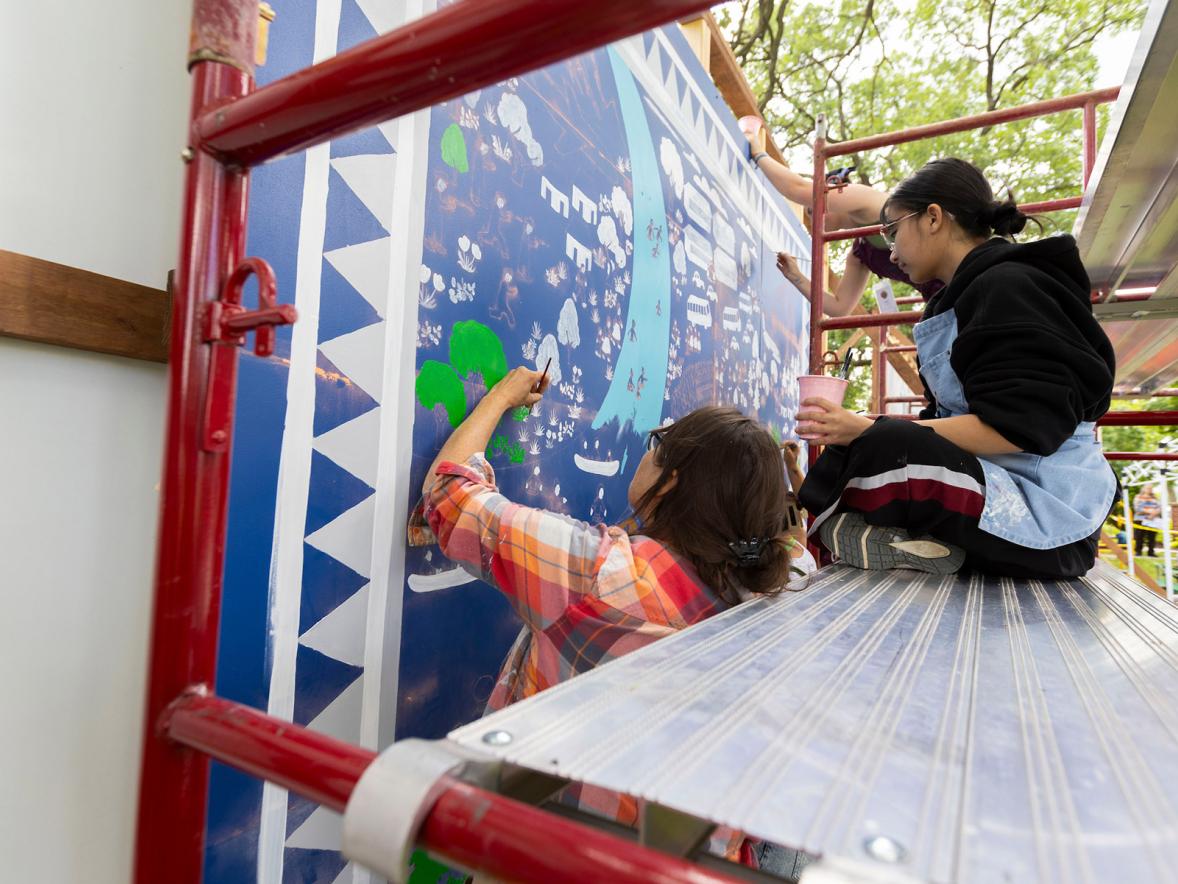 UW-Stout Polytechnic students, staff help turn community into a canvas during Murals in Menomonie Featured Image