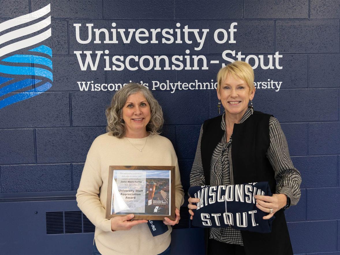 Two women with award
