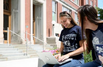 UW-Stout students are pictured interacting on campus together Tuesday, August 8, 2017. Pictured from left are Elly Friberg and Madeline Ramich. (UW-Stout Photo by Brett T. Roseman)