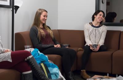 Students talking on couch
