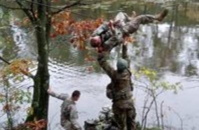 ROTC students on one rope bridge.