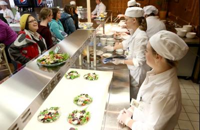 Students in Quantity Food Production warmed up a cold day Friday, December 5, 2014 with the Escape the Frost Grill Out lunch at Corner III - Cedar Cafe in Heritage Hall.