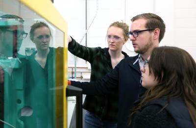 UW-Stout students in the plastics lab.