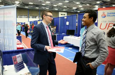 Photo of student being interviewed at Spring Career Fair.
