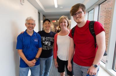 Interim Chancellor Patrick Guilfoile with students on move-in day, Fall 2019.