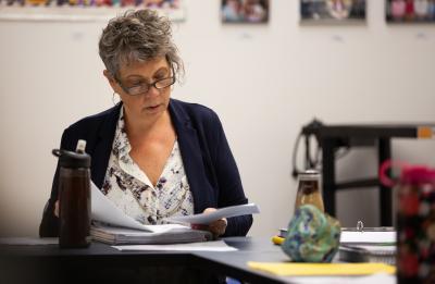 Adult learners in Dale Hawley's Foundations of Family Theraby course participate in a group discussion for the Marriage and Family Therapy graduate program.