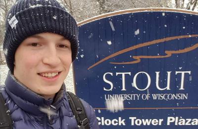 Engineering Technology students and Admissions tour guide Jake Thomas at the Stout Clock Tower Plaza.