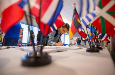 Student registering at UW-Stout's Study Abroad Fair, September 2019.