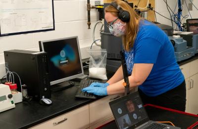 Student Emily Schattner works in the Plastics Lab at UW-Stout.