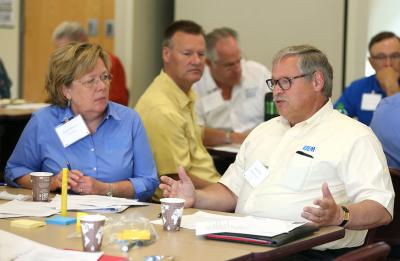 Carol Mooney and Mark Tyler talk at the CTE Summit in 2016.