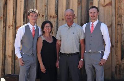 First-generation graduates, Alex and Andrew Grulkowski, with their parents.