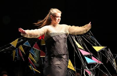 Jackie Miller modeling her design at Fashion Without Fabric, 2018.