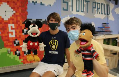 Communication studies students and EMC puppets.