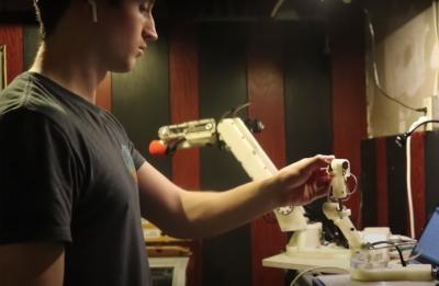 Michael Laffin demonstrates a prototype of his design.