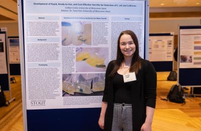 Caitlyn Lisota presents at Research Day.